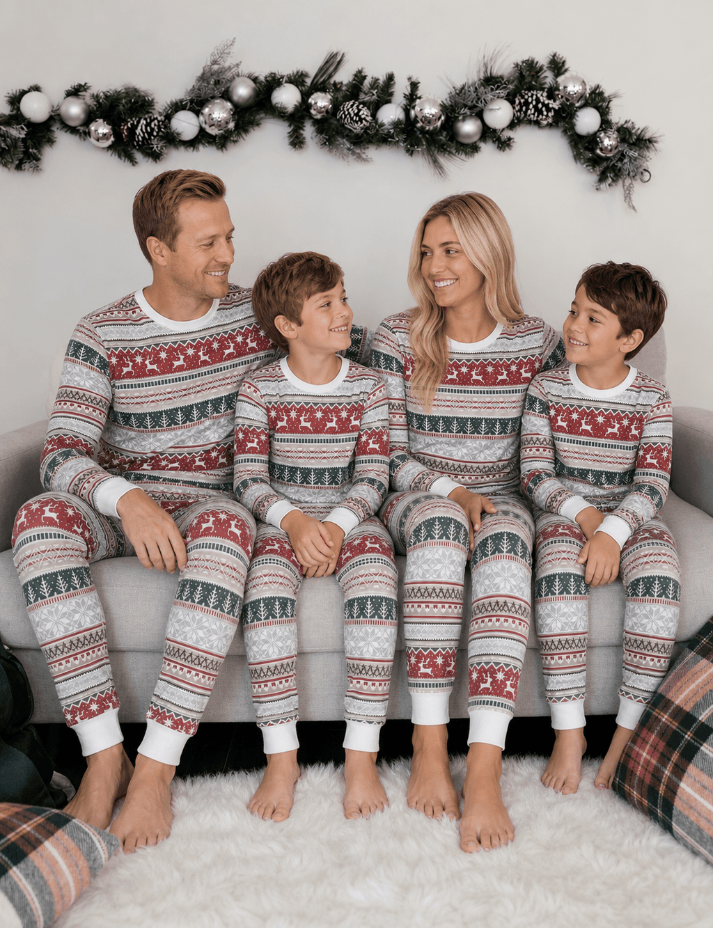 Family wearing matching Fair Isle reindeer print Christmas pajamas with white cuffs - view 5