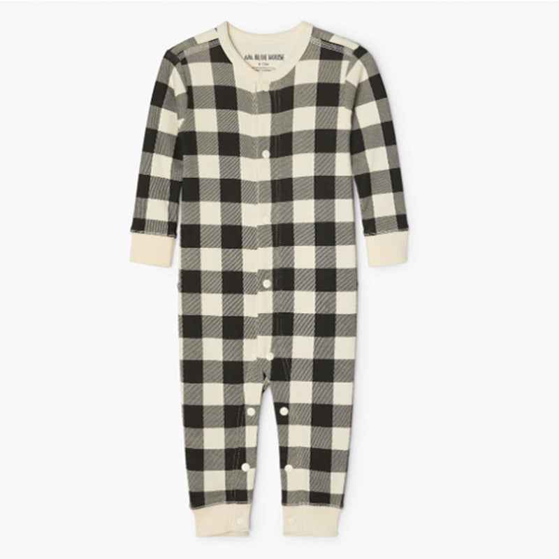 Matching holiday pajamas with checked plaid pants and dark long-sleeve tops - view 7