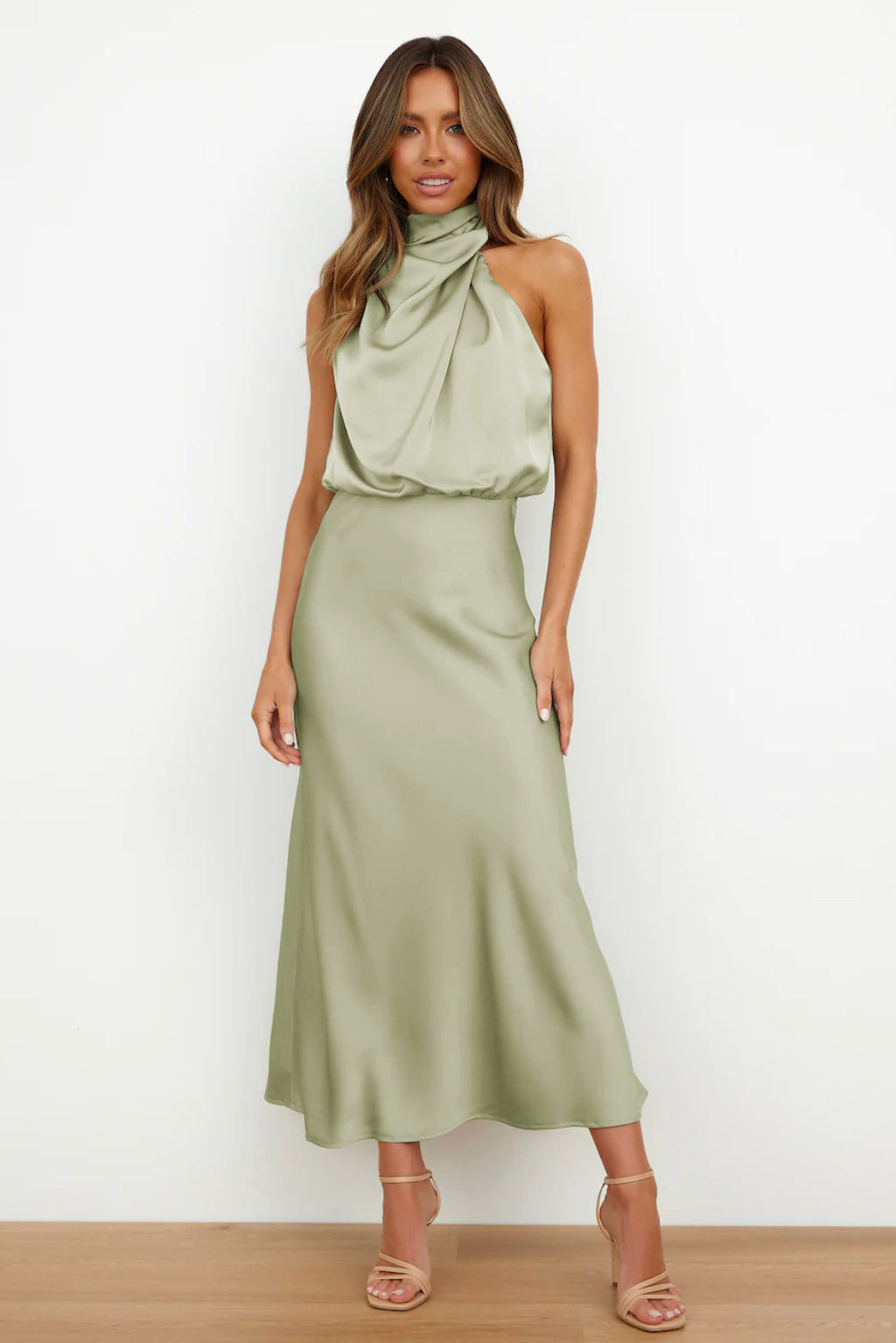 Satin halter formal evening dress with draped high neck and midi slip skirt