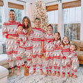 Matching family Christmas pajamas with red and white reindeer and snowflake Fair Isle print