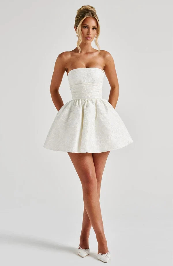 Pink jacquard homecoming mini dress with strapless bodice, corset lacing and large back bow - view 13