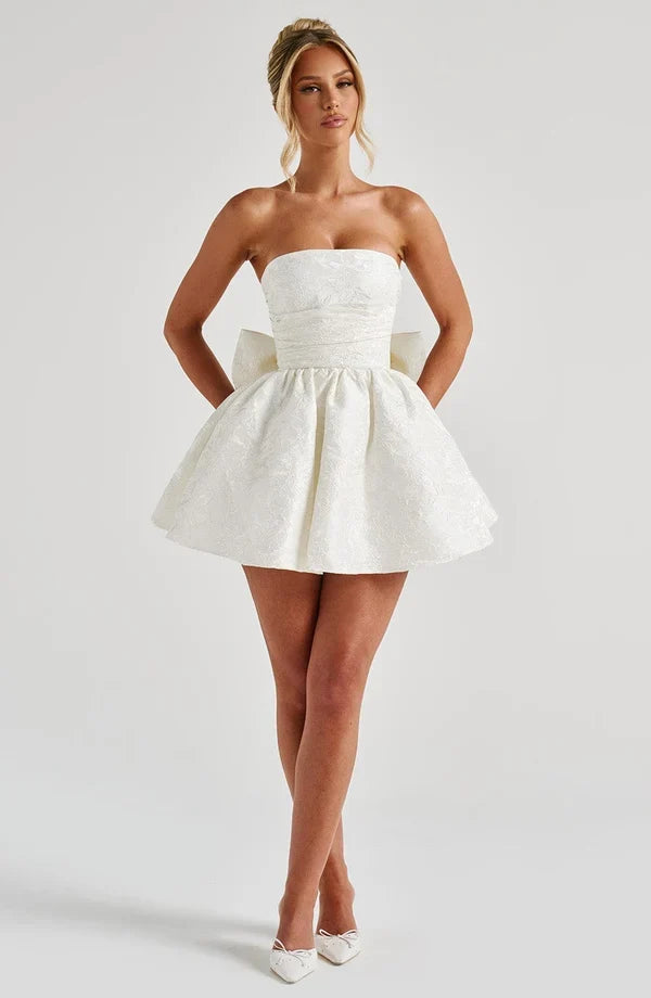 Pink jacquard homecoming mini dress with strapless bodice, corset lacing and large back bow - view 14