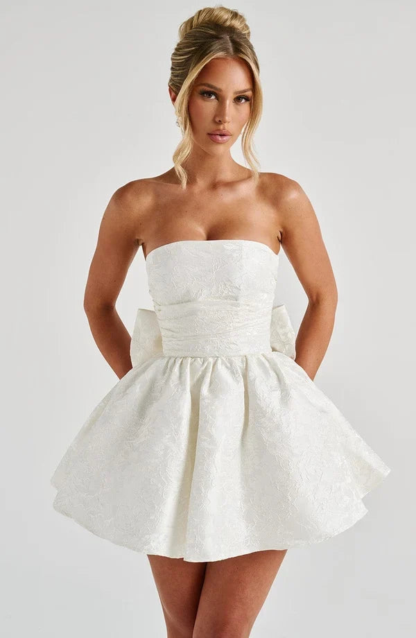 Pink jacquard homecoming mini dress with strapless bodice, corset lacing and large back bow - view 15