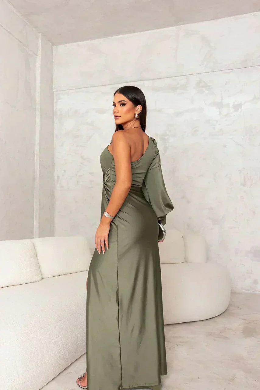Woman wearing a satin one shoulder long sleeve formal maxi dress with twist-knot waist and thigh slit - view 3