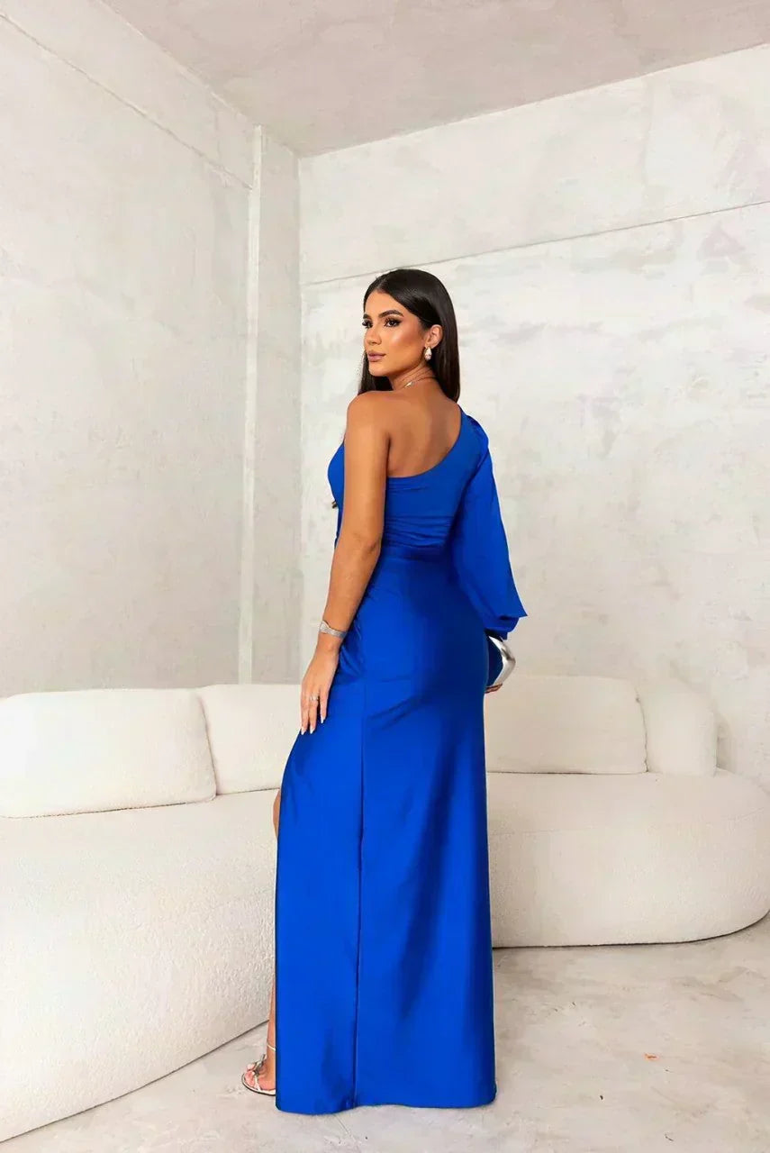 Woman wearing a satin one shoulder long sleeve formal maxi dress with twist-knot waist and thigh slit - view 7