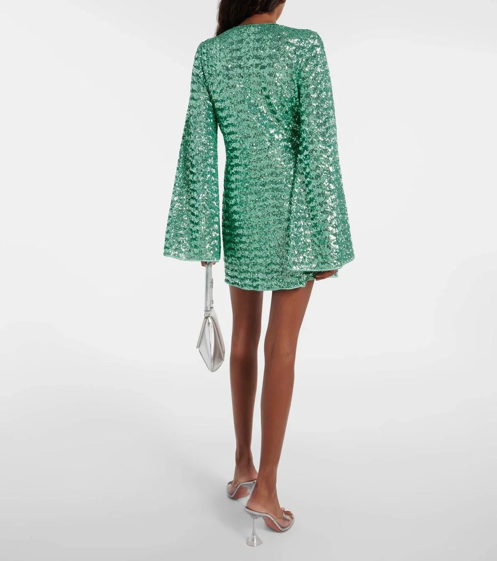 Long sleeve sequin mini dress with flared sleeves and gold-tone ring at deep V-neck - view 5