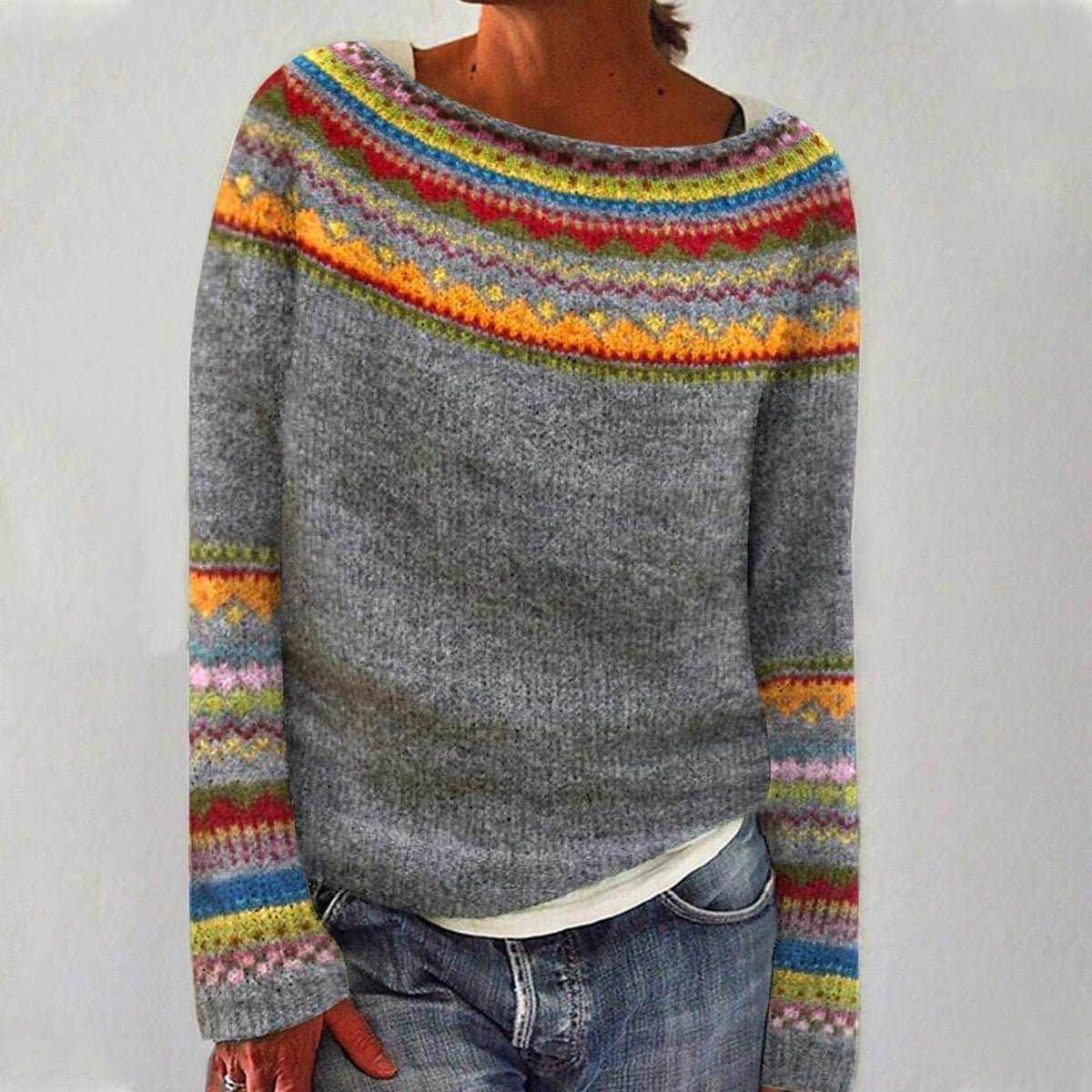 Women's relaxed fair isle yoke knit sweater worn with jeans