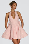 Sparkly pink halter mini dress with flared skirt and back bow