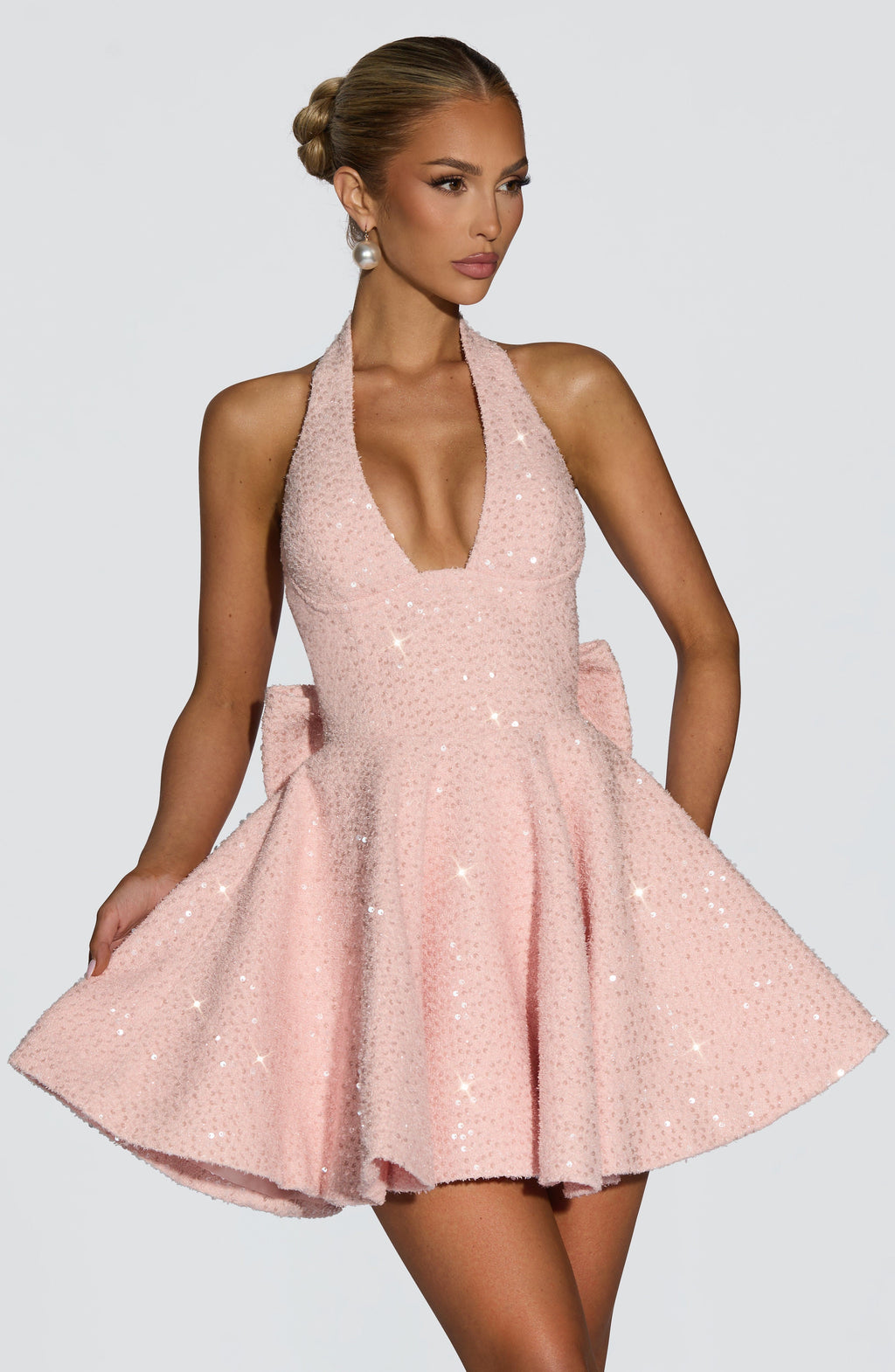 Sparkly pink halter mini dress with flared skirt and back bow - view 4