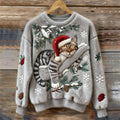 Fuzzy crew neck holiday sweater with sleeping cat in Santa hat, pine branches and snowflakes