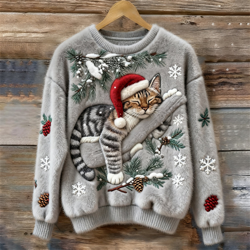 Fuzzy crew neck holiday sweater with sleeping cat in Santa hat, pine branches and snowflakes