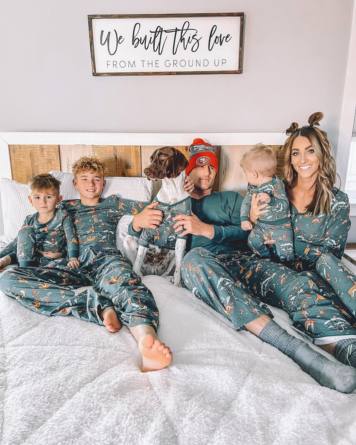 Matching family Christmas pajamas in green with festive safari animal print - view 12