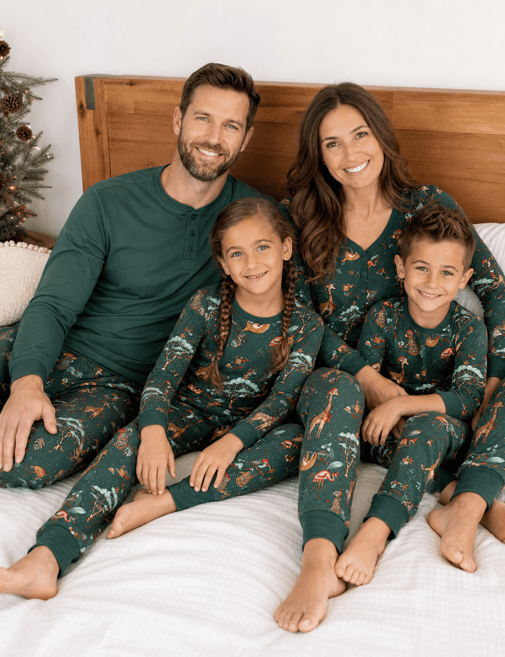 Matching family Christmas pajamas in green with festive safari animal print - view 3