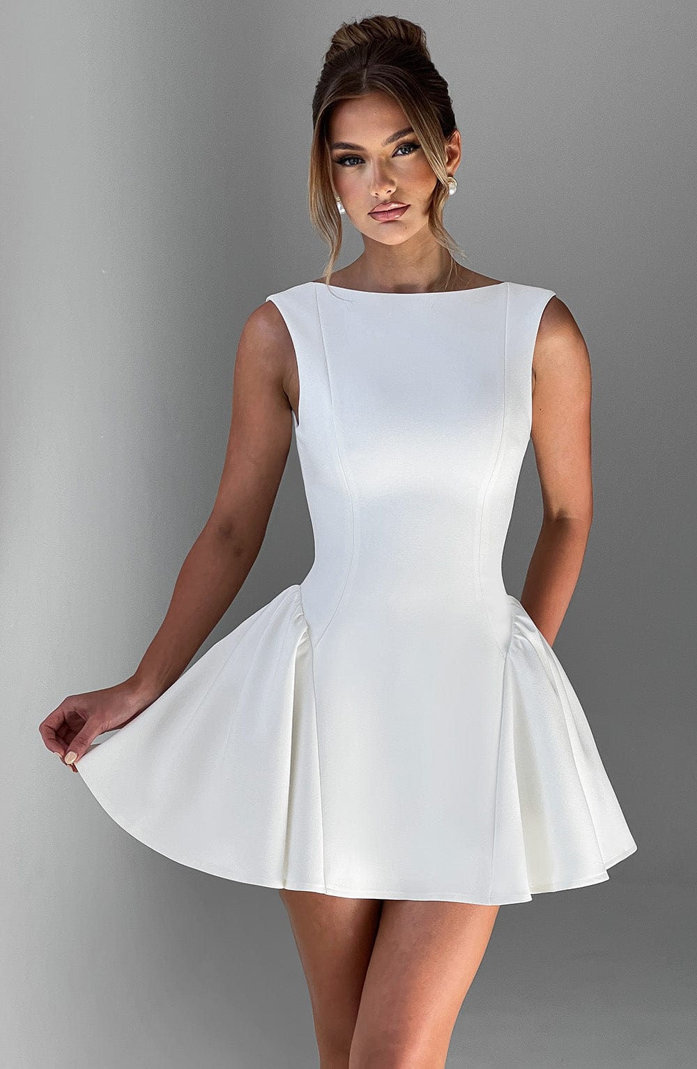 Elegant fitted mini dress with boat neck, low scoop back and full skirt - view 10