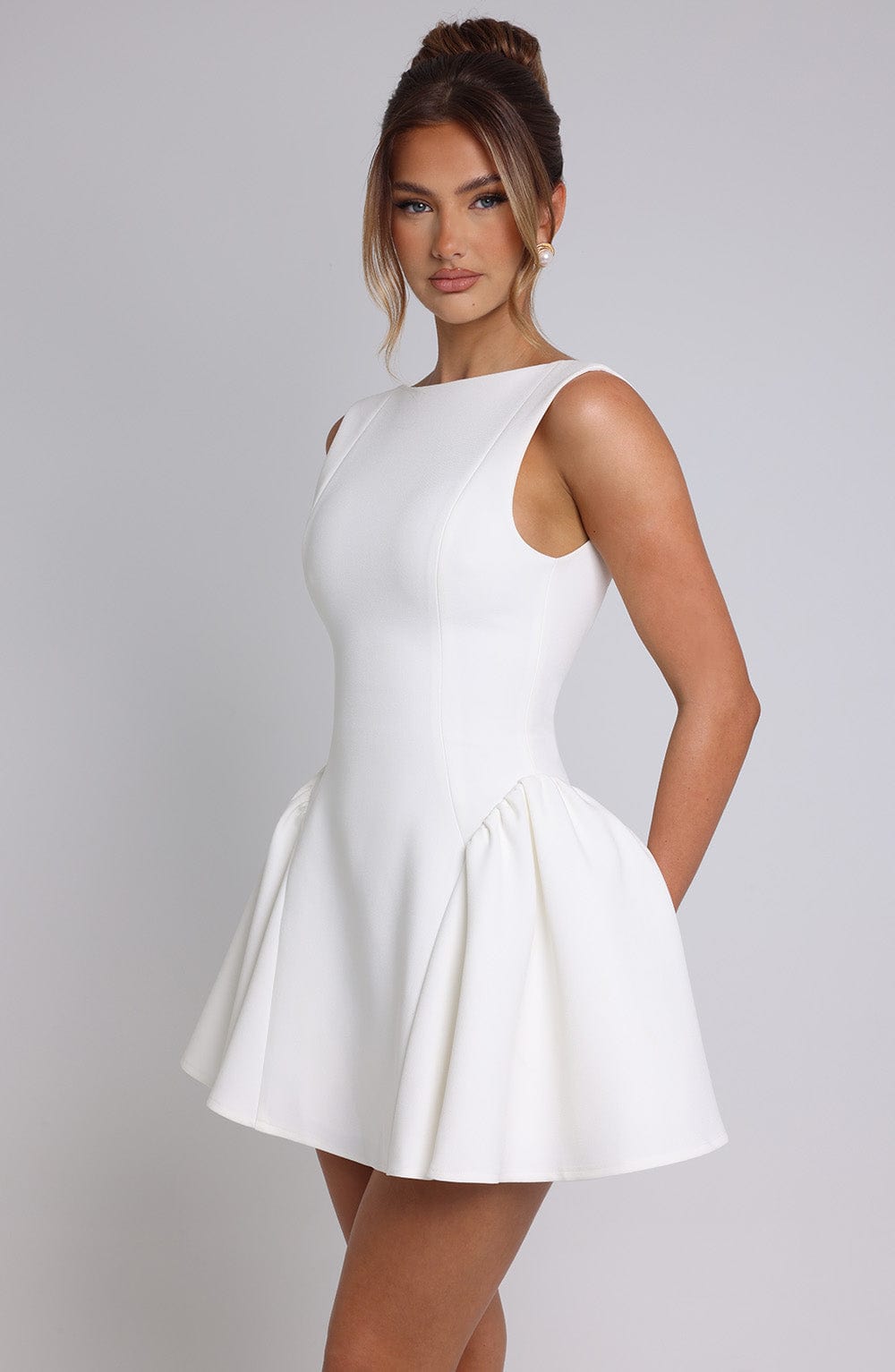 Elegant fitted mini dress with boat neck, low scoop back and full skirt - view 11