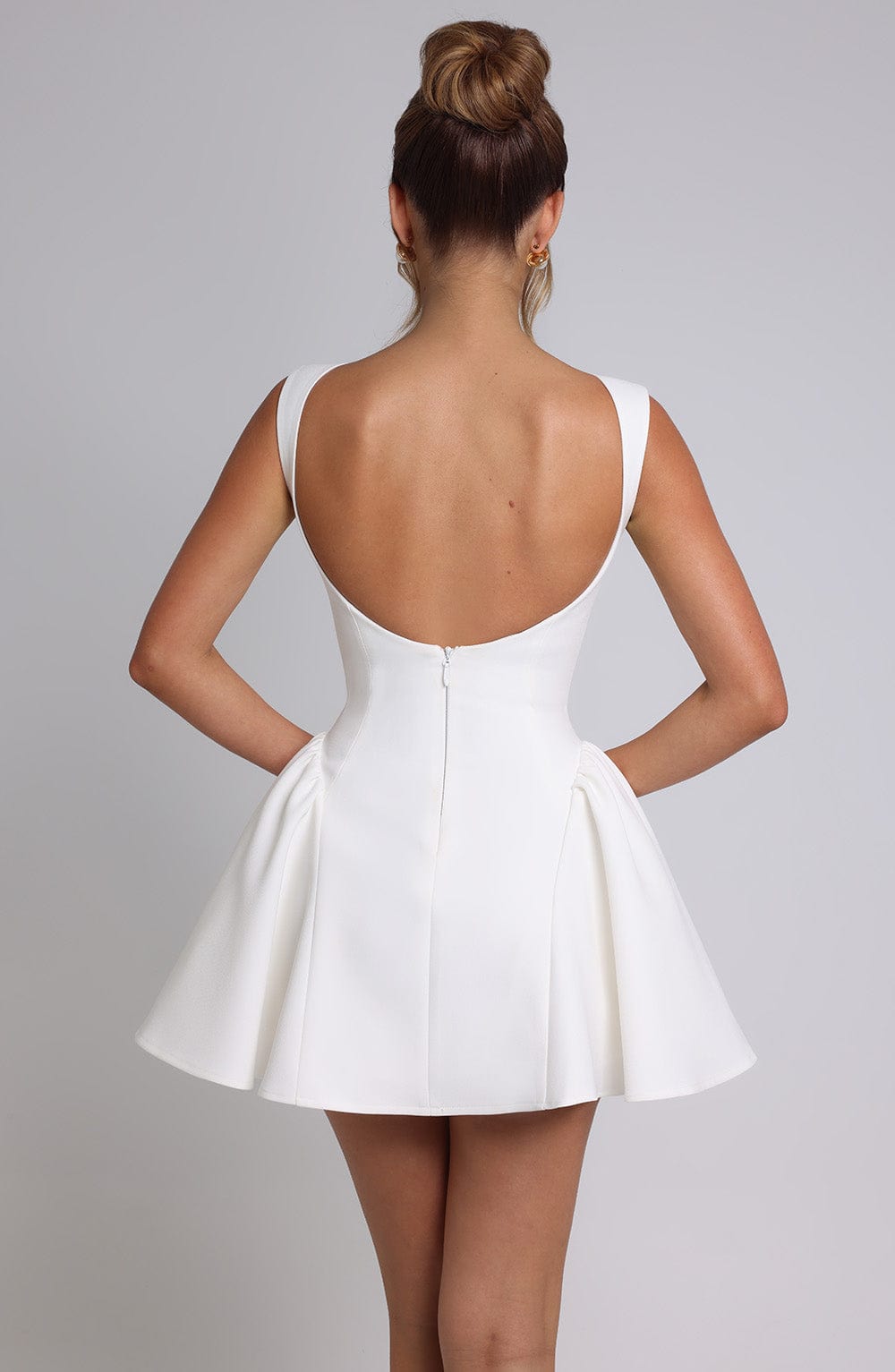 Elegant fitted mini dress with boat neck, low scoop back and full skirt - view 15